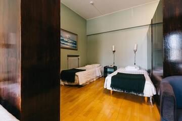 Фото номера Четырехместный номер эконом-класса Гостевой дом Comfort Guesthouse г. Пиетарсаари 4