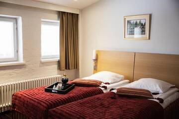 Фото номера Стандартный двухместный номер с 1 кроватью Отель Hotel Epoque &amp; Apartments г. Пиетарсаари 10